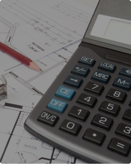 Calculator on top of architectural blueprints with a red pencil, symbolizing precise measurements, calculations, and planning for construction or design projects.